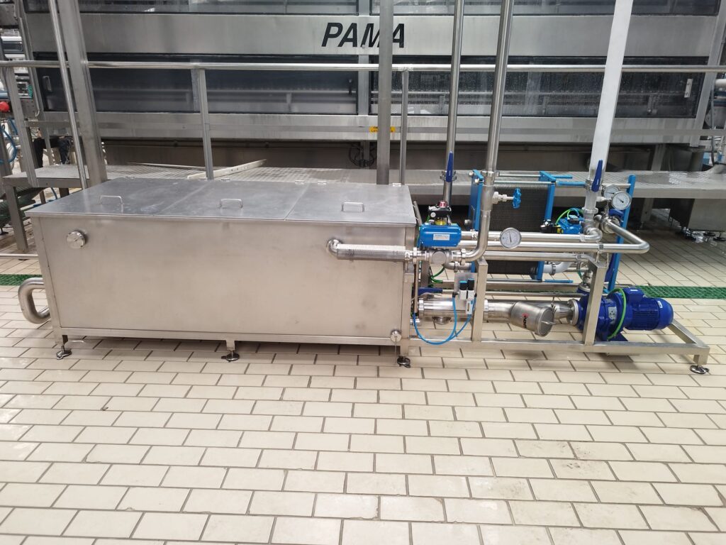 Sistema industrial para la reducción del consumo de agua en la industria alimentaria mediante medición y automatización